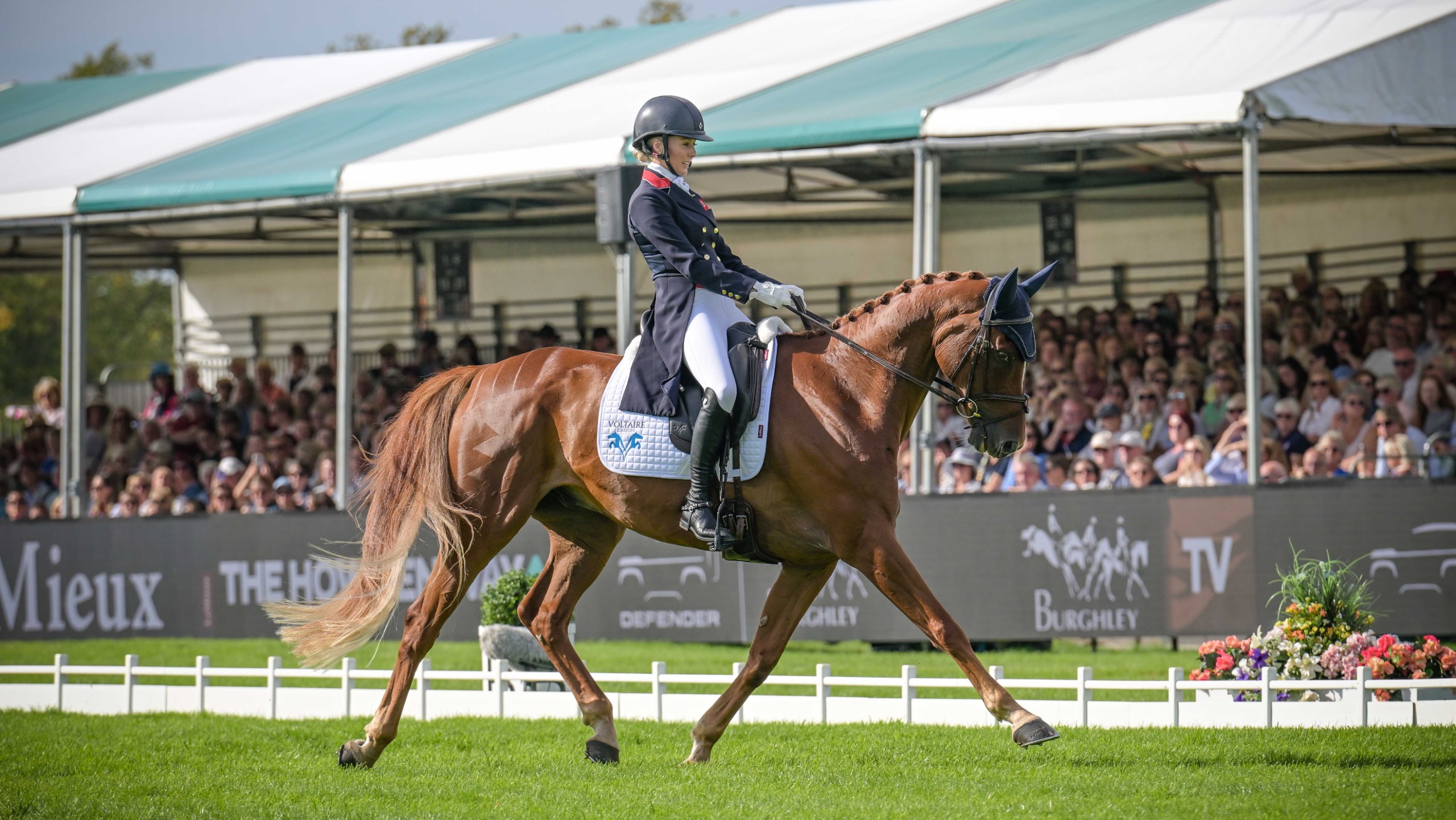 Yasmin Ingham rides a medium trot on her horse Goliath Du Loir at the 2026 Defender Burghley Horse Trials