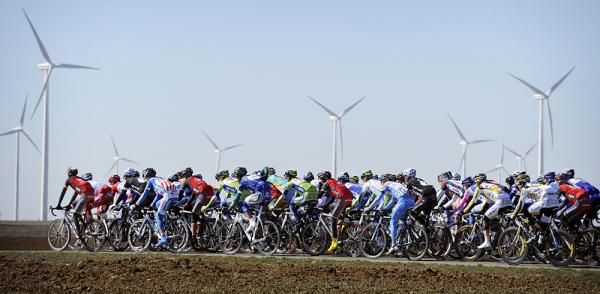 The windmills spin along with the riders