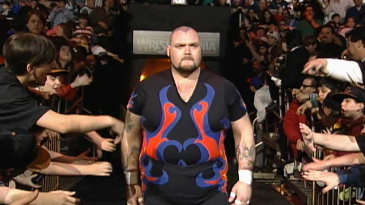 Bam Bam Bigelow walks to the ring during WrestleMania X.