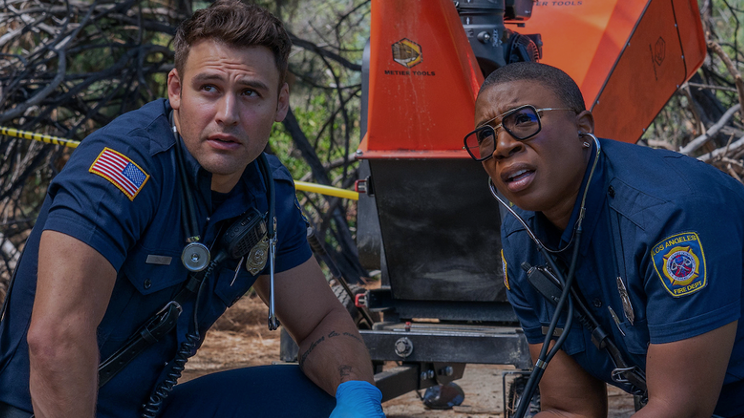 Paramedics Edmundo &quot;Eddie&quot; Diaz (played by Ryan Guzman) and Henrietta &quot;Hen&quot; Wilson (Aisha Hinds) work on a badly injured man in &#039;9-1-1&#039; season 7.