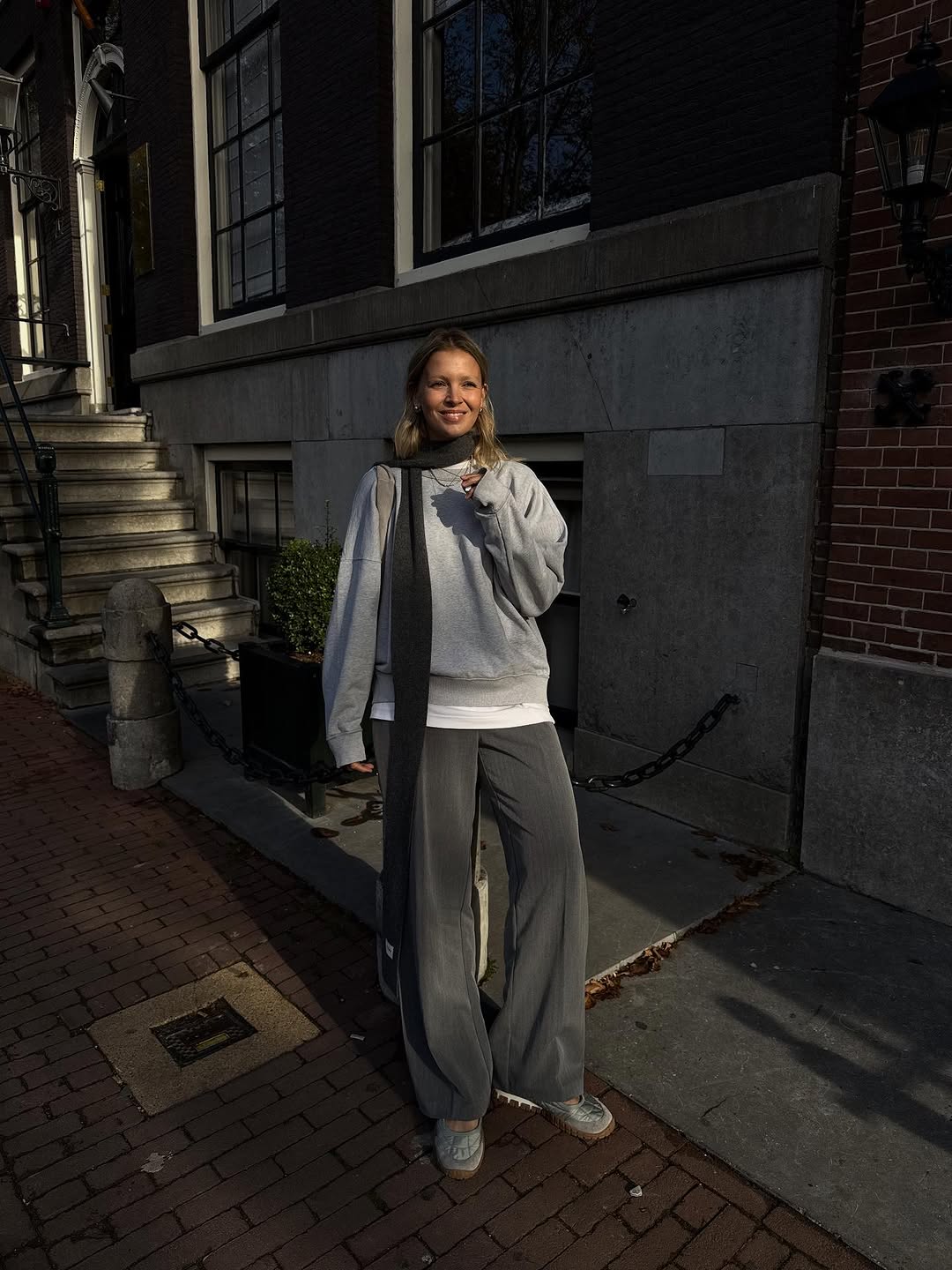 woman wearing winter scarf outfit 2025