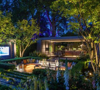 roost episode 3 - a garden from Chelsea Flower Show with lighting and outdoor seated area - Pic-credit-John-Cullen-Lighting