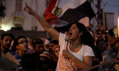 An Egyptian opposition protester chants during a demonstration at the Egyptian Presidential Palace on June 30 in Cairo.