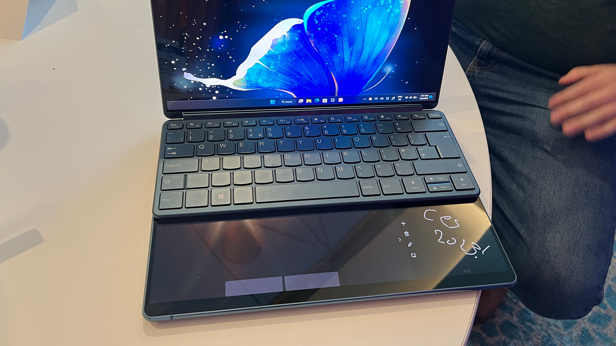 A Lenovo Yoga Book 9i on a table