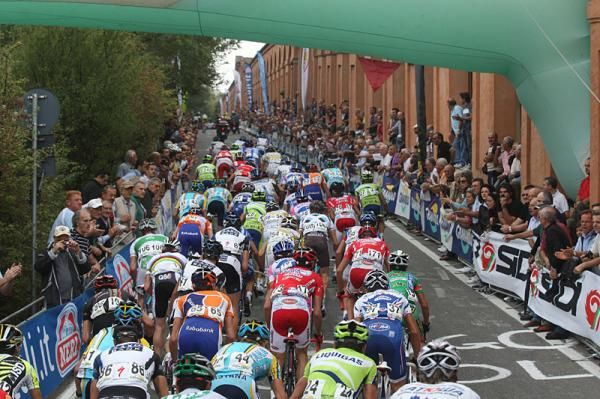 Riders climb the San Luca
