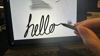 An Adonit Note+ 2 stylus on a desk