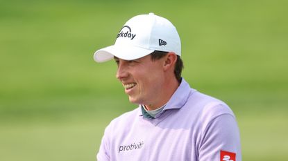 Matt Fitzpatrick smiling during a practice round for the 2023 PGA Championship
