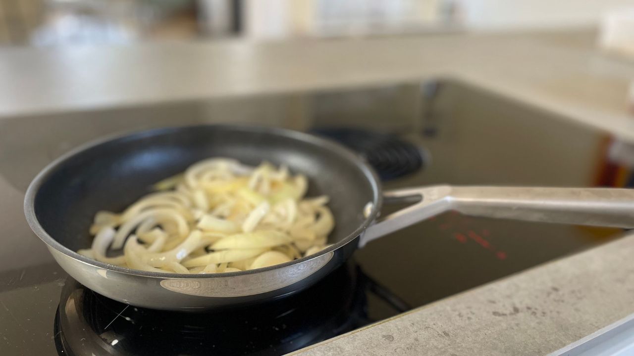 Frying onions in the Ninja NeverStick frying pan on an induction hob
