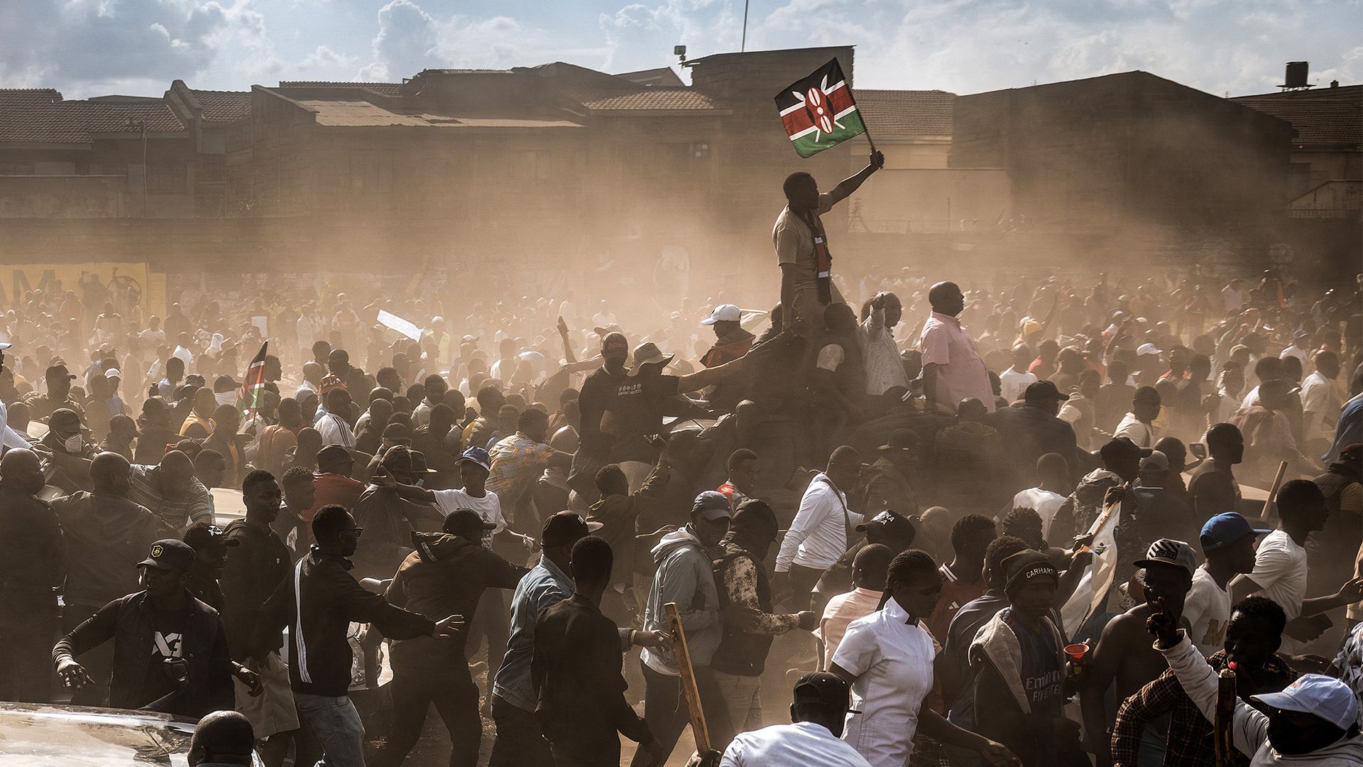 
                                Supporters of the opposition coalition wave flags and chant slogans at an anti-government rally in Nairobi, Kenya
                            