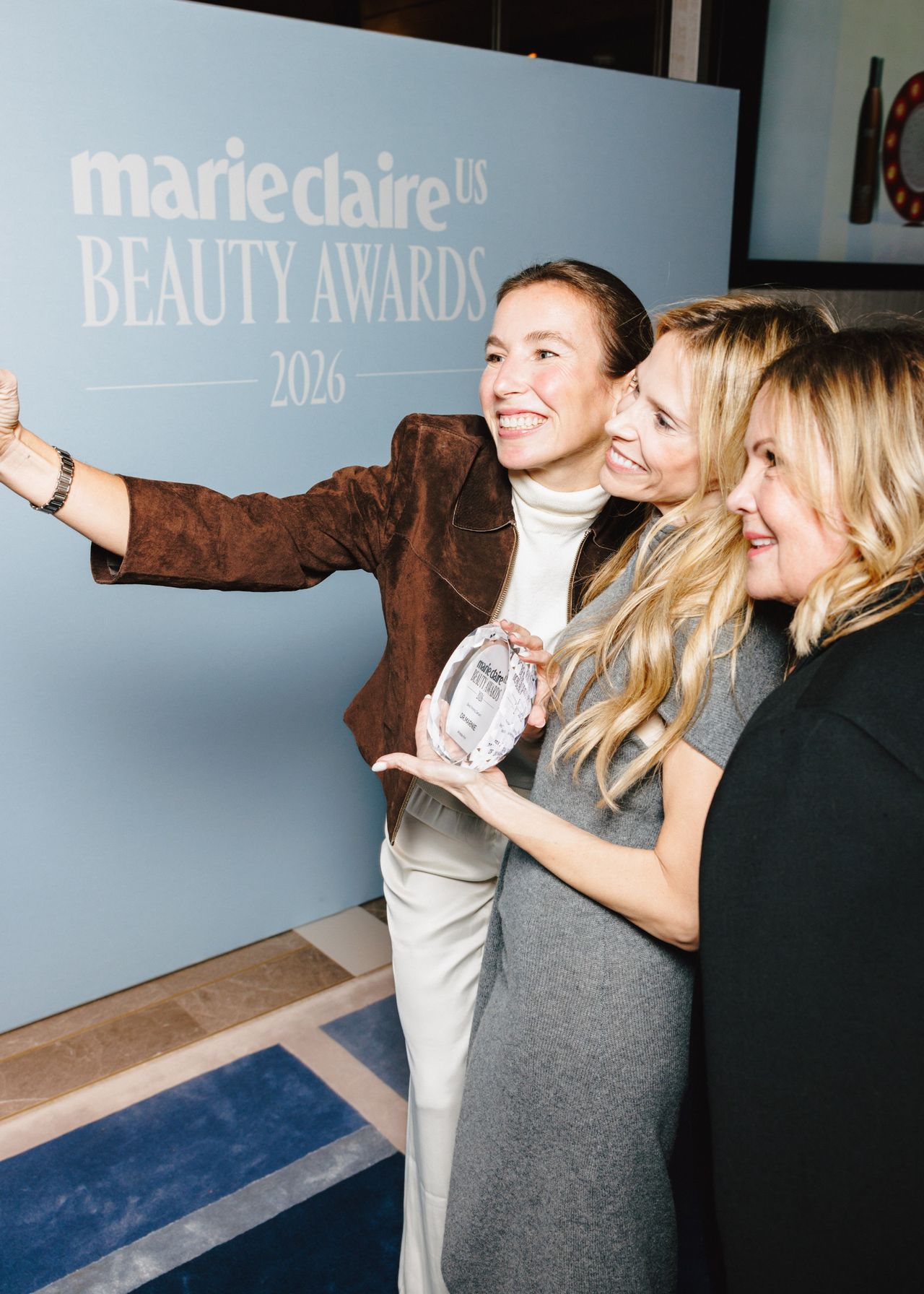 three white women taking a selfie