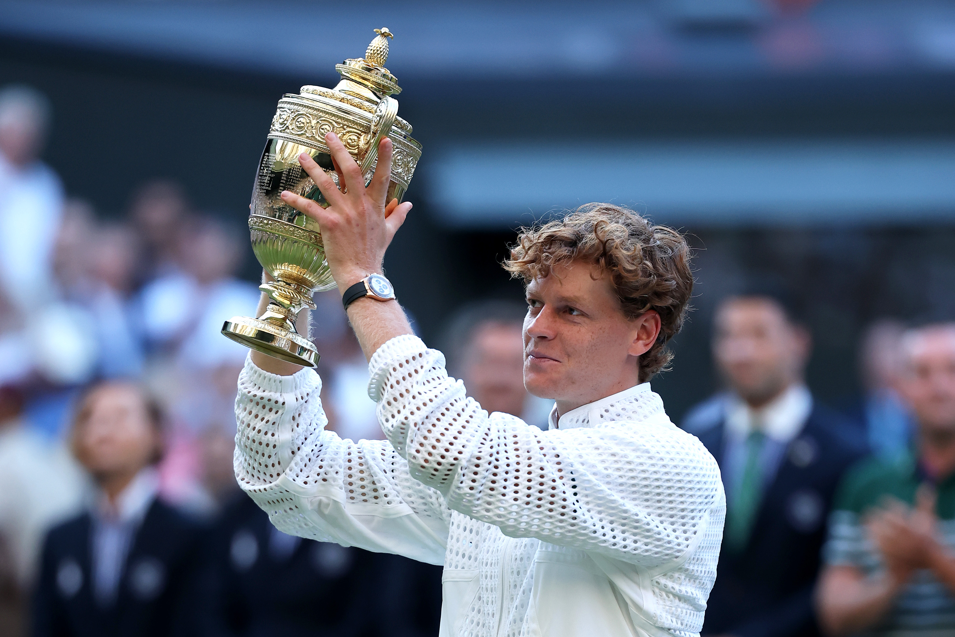 Jannik Sinner raises the Wimbledon Men's Singles 2026 trophy