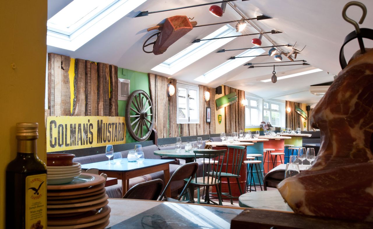 There are unique metal drum tables at this Notting Hill restaurant