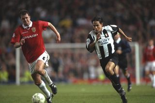 Juventus striker Filippo Inzaghi is chased by Manchester United's Gary Pallister during a match in October 1997.