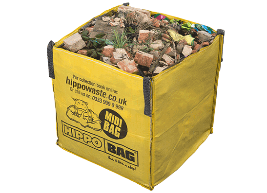 yellow hippo bag filled with rubble and waste
