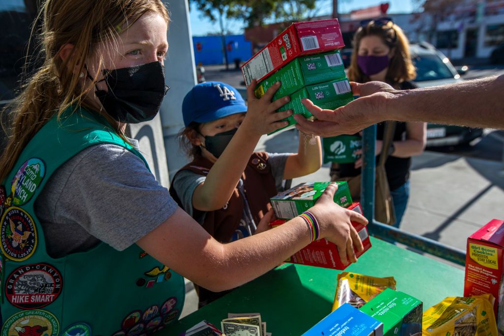 Girl Scouts selling cookies