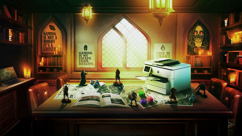 A HP printer on a table surrounded by TTRPG goodies