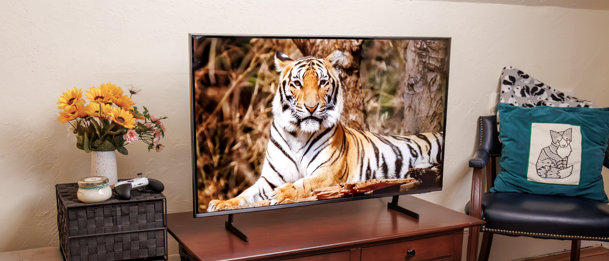 Samsung Q7F QLED TV on a side table