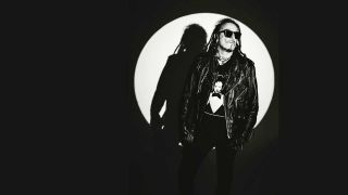 Ginger Wildheart in a spotlight