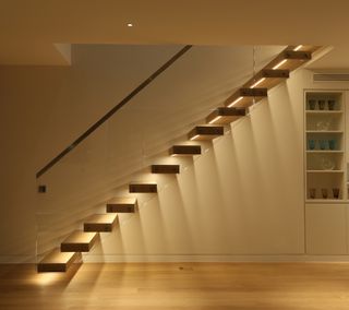 lit staircase in contemporary hallway