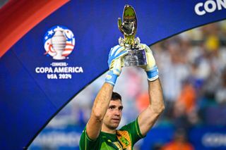 Emi Martinez with his Copa America Golden Glove after Argentina's win in the final against Colombia in July 2024.