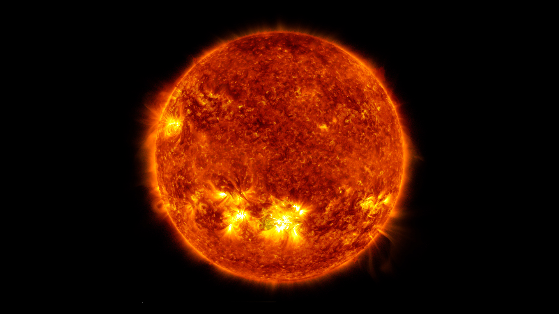 Image of the glowing orange and yellow orb that is the sun.