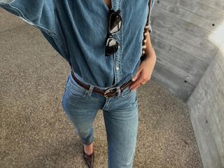 Sara Walker in denim-on-denim outfit.