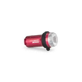 A red bike light on a white background