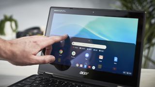 Someone using Acer Chromebook Spin 311's touchscreen