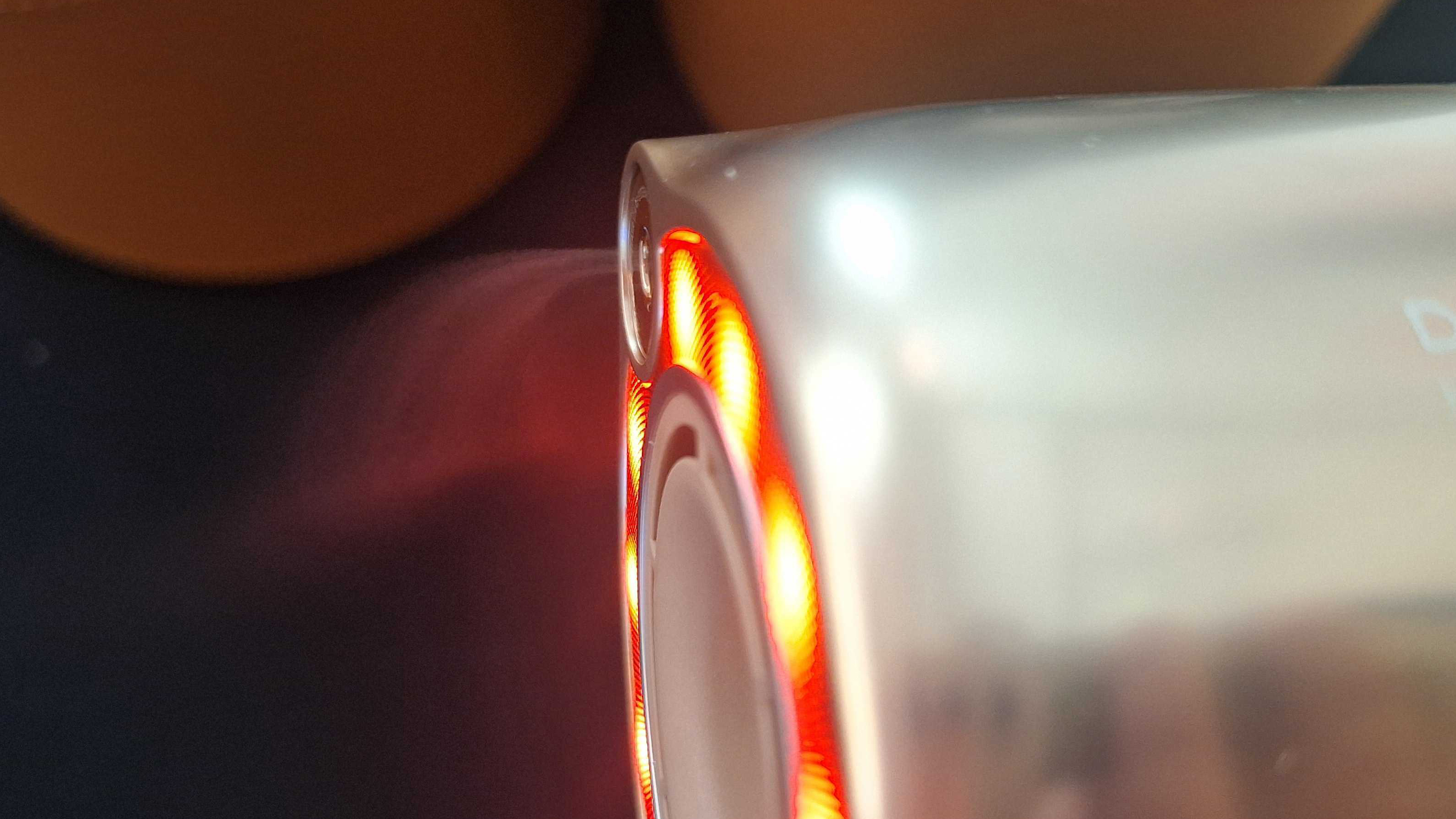 Dreame Miracle Pro hair dryer emitting a mist of essence