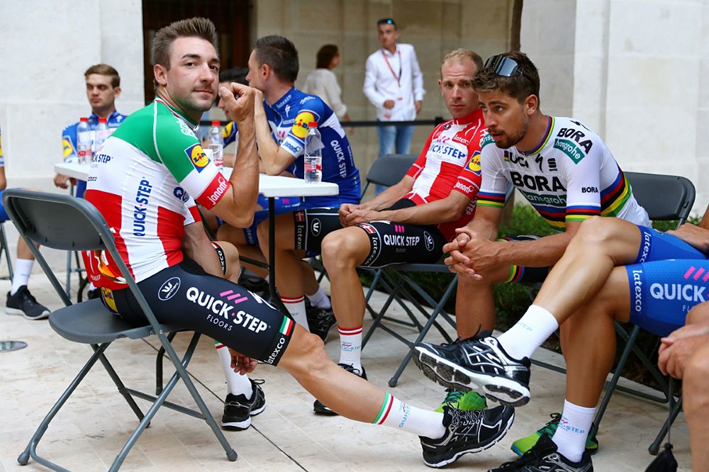 RIders wait to be called up at the Vuelta a Espa&ntilde;a team presentation