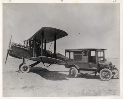 A U.S mail truck and airplane in 1922.