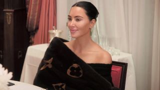 Kim Kardashian looking forward in The Kardashians. 