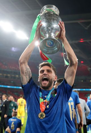 Domenico Berardi celebrates after helping Italy to Euro 2020 success