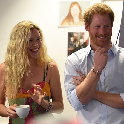 LONDON, ENGLAND - JUNE 27: Joss Stone and Prince Harry watch members of the Basotho Youth Choir during their rehearsals at the Brit School on June 27, 2016 in London, England. The Basotho Youth Choir will perform alongside Sentebale Ambassador Joss Stone at tomorrow's Sentebale Concert at Kensington Palace, headlined by Coldplay. The choir members have all been supported by Sentebale's Secondary School Bursaries Progamme or Care for Vulnerable Children Programme. The Bursaries Programme covers the cost of school fees, uniforms and books for some of Lesotho's most disadvantaged children. (Photo by : Andrew Matthews - WPA Pool/Getty Images)