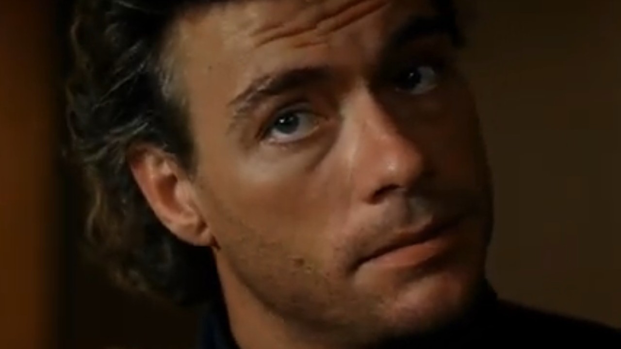 Jean-Claude Van Damme giving a warning stare in Timecop
