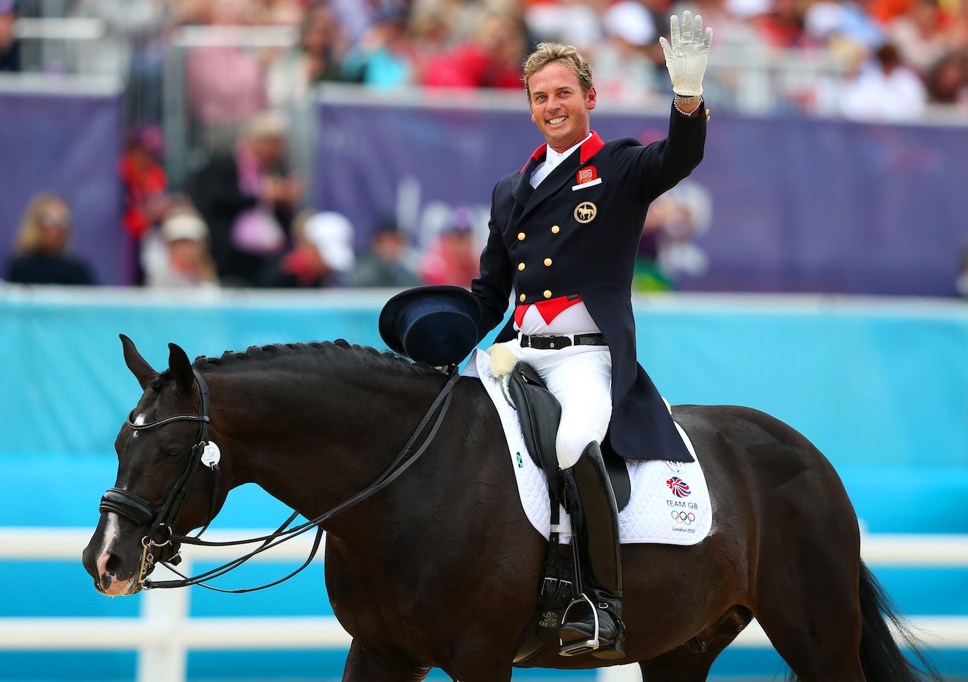 Carl Hester celebrates his dressage test on Uthopia