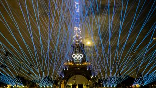 Eiffel Tower lit up by laser light field at night at the rehearsal for the Opening Ceremony of the 2024 Paris Olympic Games.