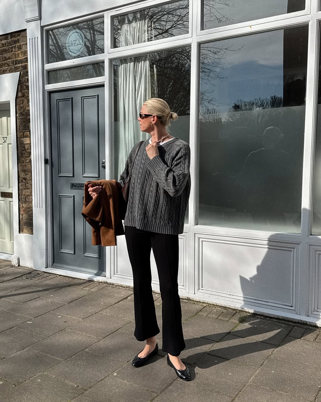 Lindsey Holland wears cut flare pants