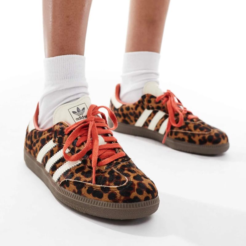 Leopard print sambas on model 