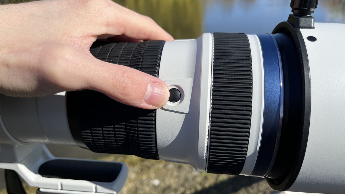 Mike Harris holding OM System M.Zuiko 150-400mm f/4.5 TC1.25x IS PRO at Slimbridge Wetland Centre