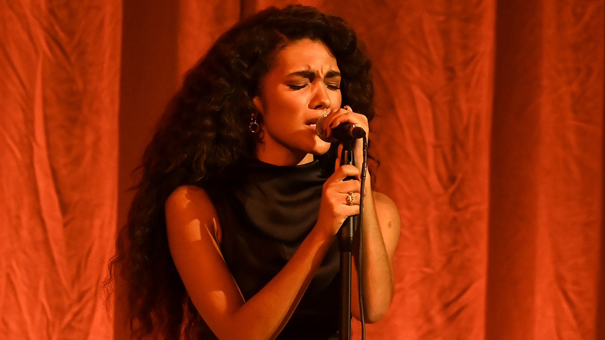 MANCHESTER, ENGLAND - MARCH 26: Olivia Dean performs onstage during the 2026 MOBO Awards at Co-op Live on March 26, 2026 in Manchester, England. (Photo by Joseph Okpako/Getty Images for MOBO)