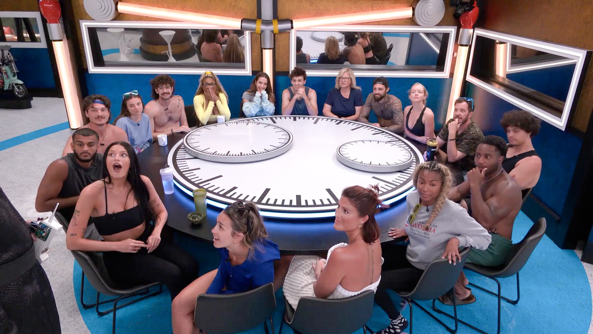 The Season 28 Houseguests gathered around the table.