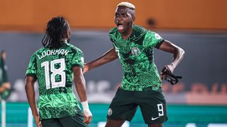 Ademola Lookman (L) celebrates a Nigeria goal at AFCON with Victor Osimhen (R)