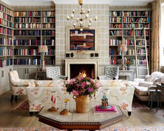 White library with patterned sofa