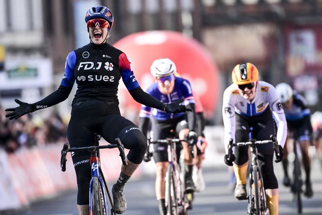 Victoria Guazzini celebrates after winning the 'Grand Prix du Samyn' one day cycling race, 202km from Quaregnon to Dour on Tuesday 27 February 2024, the first (out of 10) race of the Lotto Cycling Cup. BELGA PHOTO LAURIE DIEFFEMBACQ (Photo by LAURIE DIEFFEMBACQ / BELGA MAG / Belga via AFP)