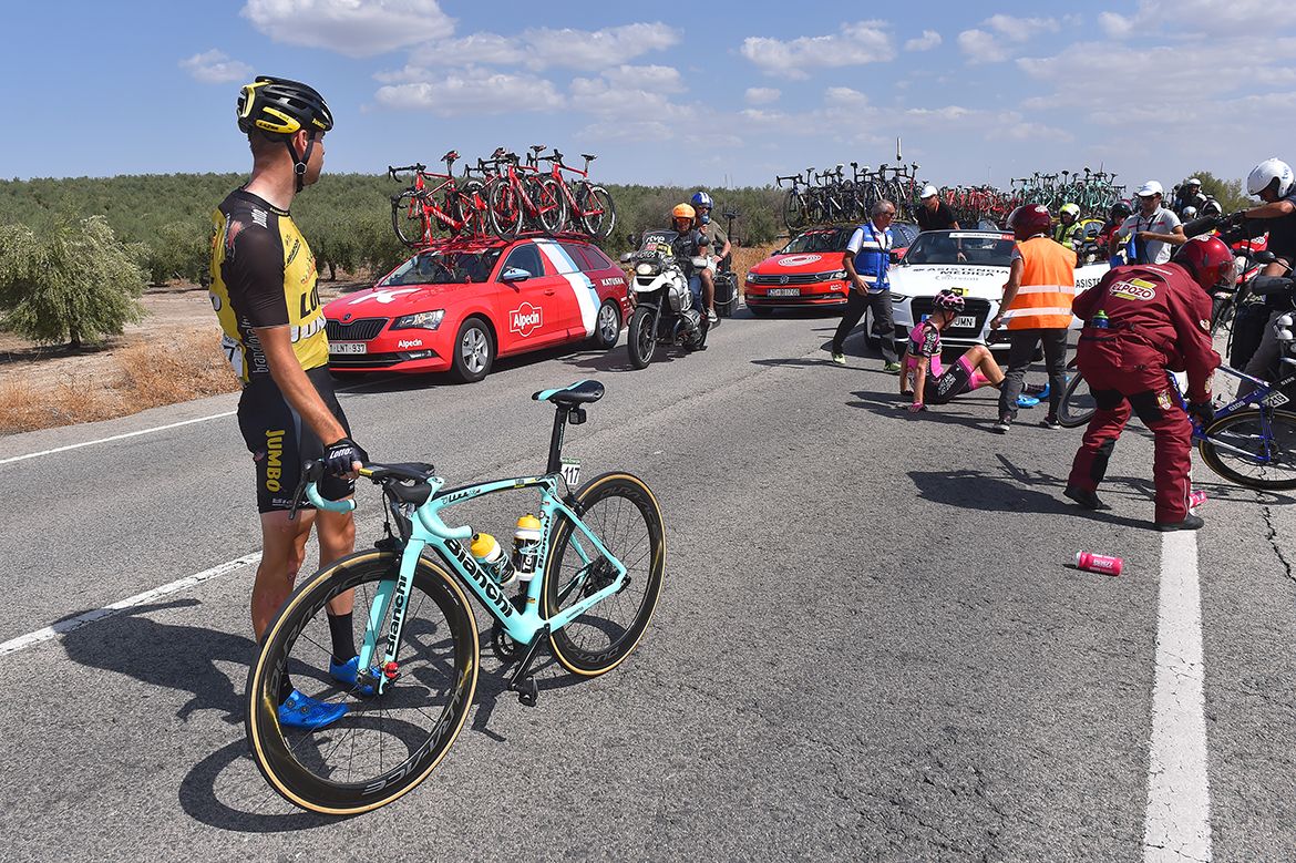 Bert-Jan Lindeman waits for a new bike