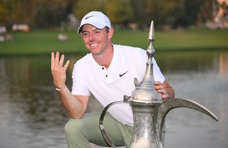 Rory McIlroy celebrates winning the 2024 Dubai Desert Classic