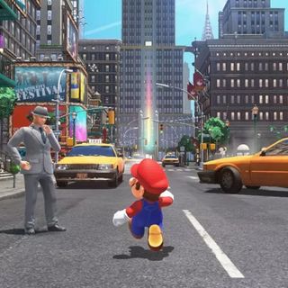 Mario crosses busy city steet in Super Mario Odyssey, one of the best Nintendo Switch games