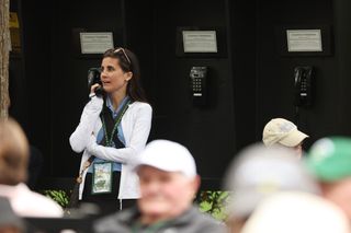 A woman on the phone at The Masters