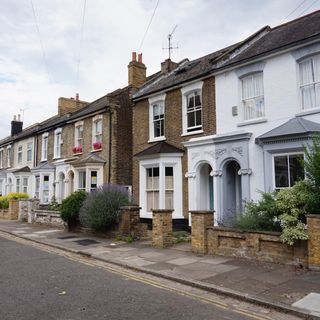 house with brick walls and white wall